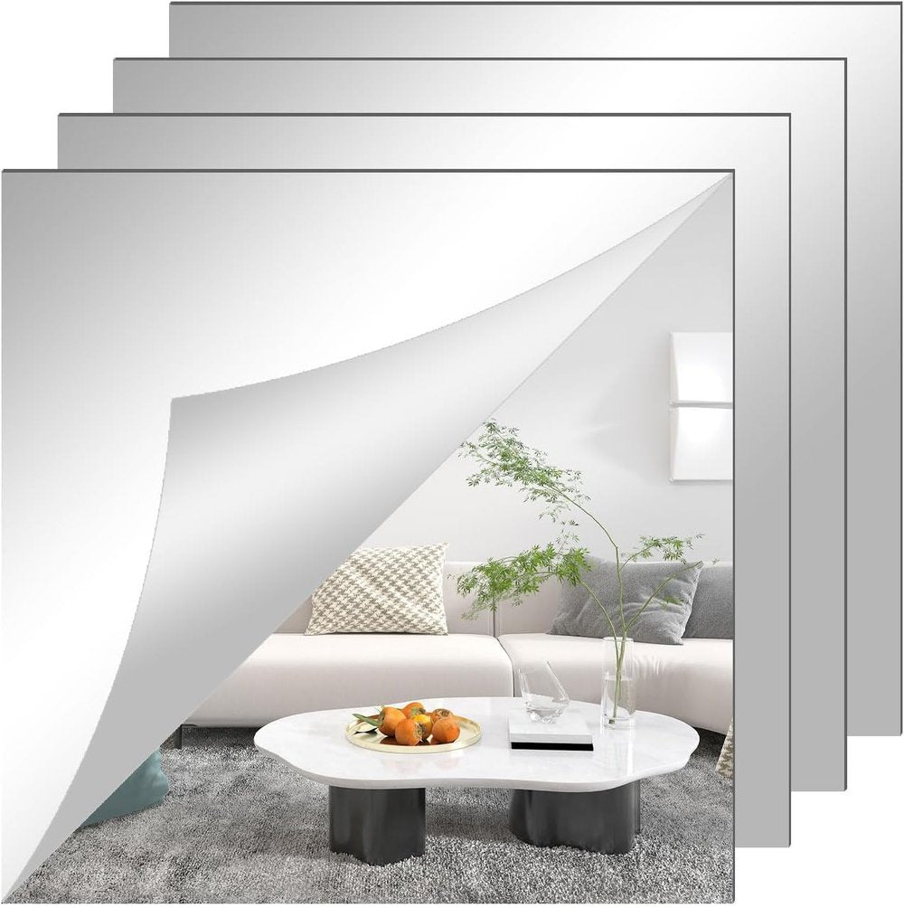Vier quadratische Spiegelfolien übereinander, die vorderste mit abgelöster Ecke und Wohnzimmer als Spiegelbild 3