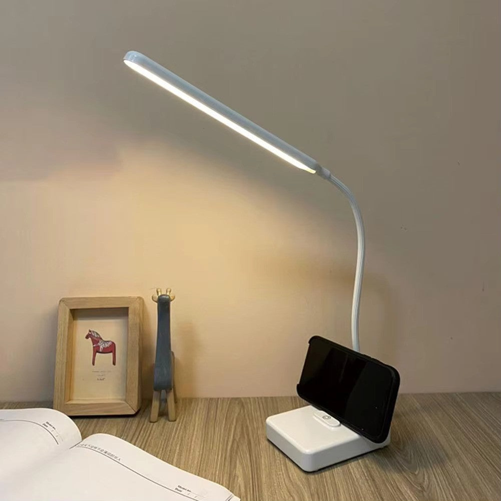 LED-Schreibtischlampe mit flexiblem Hals, weiß, Handyhalter, modernes Design, energiesparend.