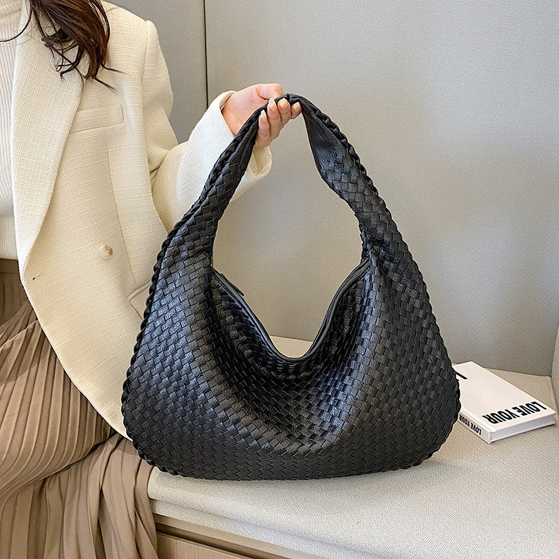 Damenhandtasche aus schwarzem Leder, geflochtenes Design, modisch, elegant, Alltagsgebrauch.