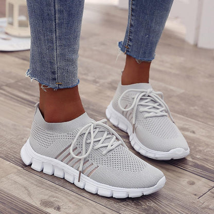 Graue Damen-Sneaker, atmungsaktiv, rutschfeste Sohle, ideal für Fitnessstudio und Sport.