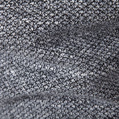 Graues Strickgewebe, Nahaufnahme, Textur, weiches Material, modisch, hochwertig, Detailansicht.