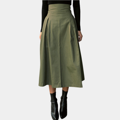 Grüner Midirock aus Baumwolle, hoher Bund, Falten, Damenmode, elegant, zeitloses Design.