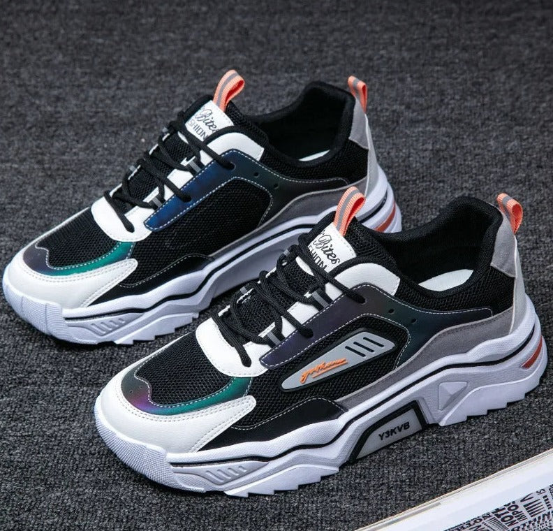 Modische schwarze und weiße Sneaker, atmungsaktiv, sportlich, Herren, bequem, Straßenstil.