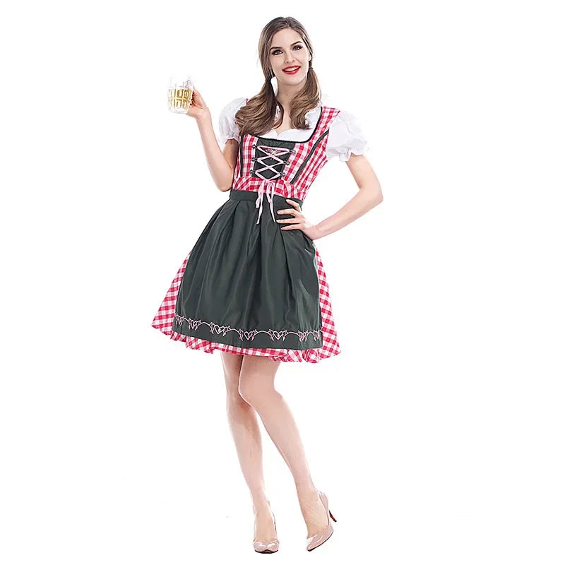 Rot-weiß kariertes Dirndl mit dunkelgrüner Schürze und weißer Puffärmelbluse, Frontansicht.