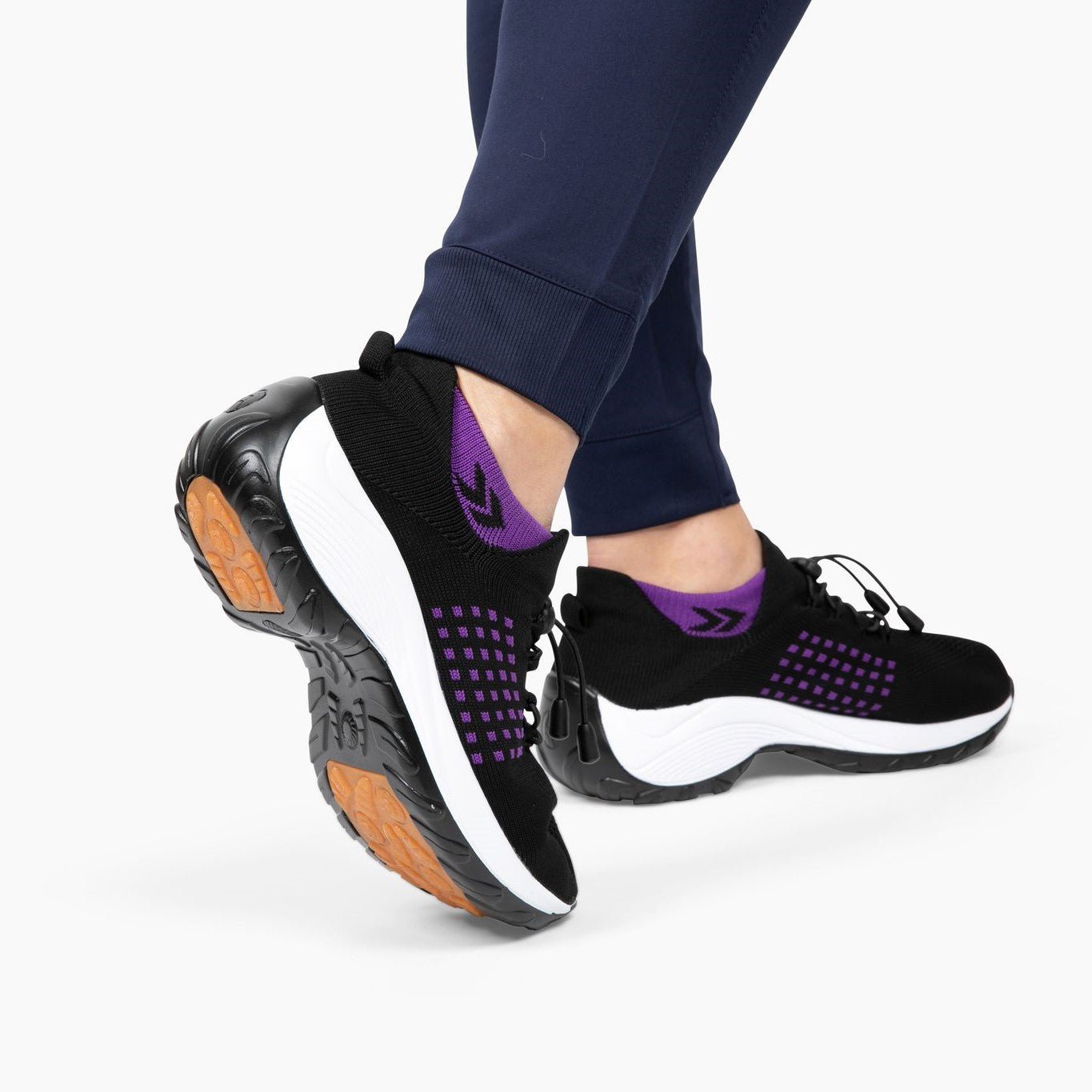 Schwarze und lila Orthopädische Stretch-Schuhe, rutschfeste Sohle, Damenmode.