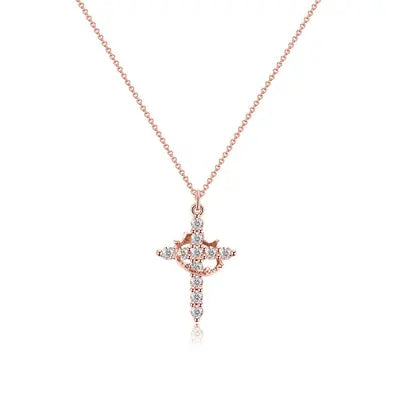 Roségoldfarbene Variante der Kreuzkette mit Krone und glitzernden Steinen, frontal auf weißem Hintergrund. 5