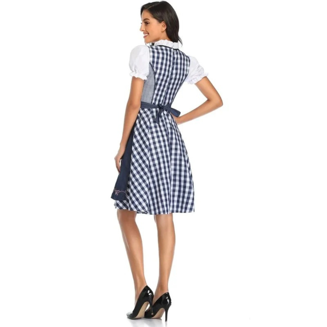 Rückansicht des blau-weiß karierten Dirndls mit dunkelblauer Schürze, Schleife und Reißverschluss