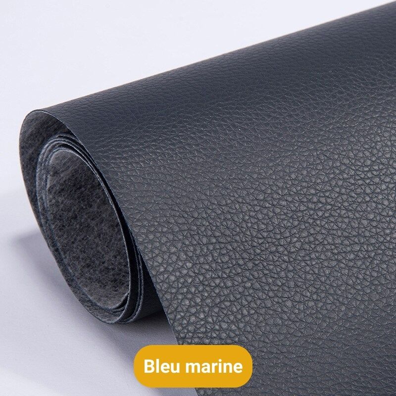 Selbstklebender Lederreparaturflicken in dunklem Marineblau mit Lederprägung und flauschiger Rückseite.