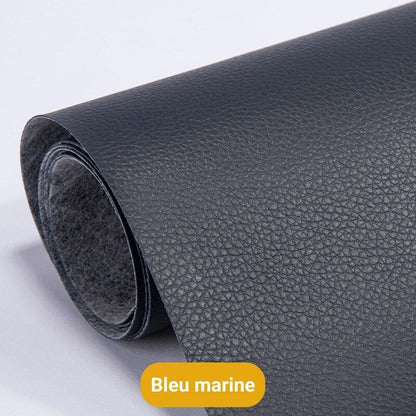 Selbstklebender Lederreparaturflicken in dunklem Marineblau mit Lederprägung und flauschiger Rückseite.