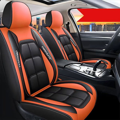 Vordere Autositzbezüge in schwarz und orange aus PU-Leder im Auto, Innenansicht