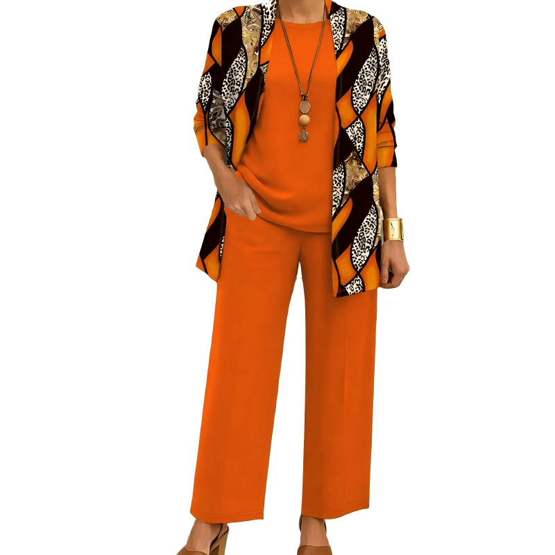 Oranges Set mit Cardigan in Wellenmuster aus Orange, Braun und Leopardenprint, dazu einfarbiges Shirt und weite Hose. 9