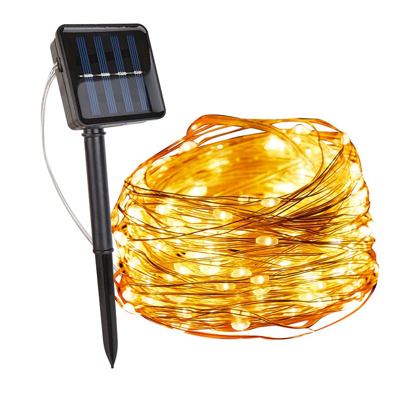 Solarbetriebene Lichterkette warmweiß, Kupferdraht, Außenbereich, energiesparend, dekorativ.