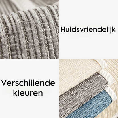 Nahaufnahme der grauen Stoffstruktur und Stoffmuster in Creme, Grau und Blau.