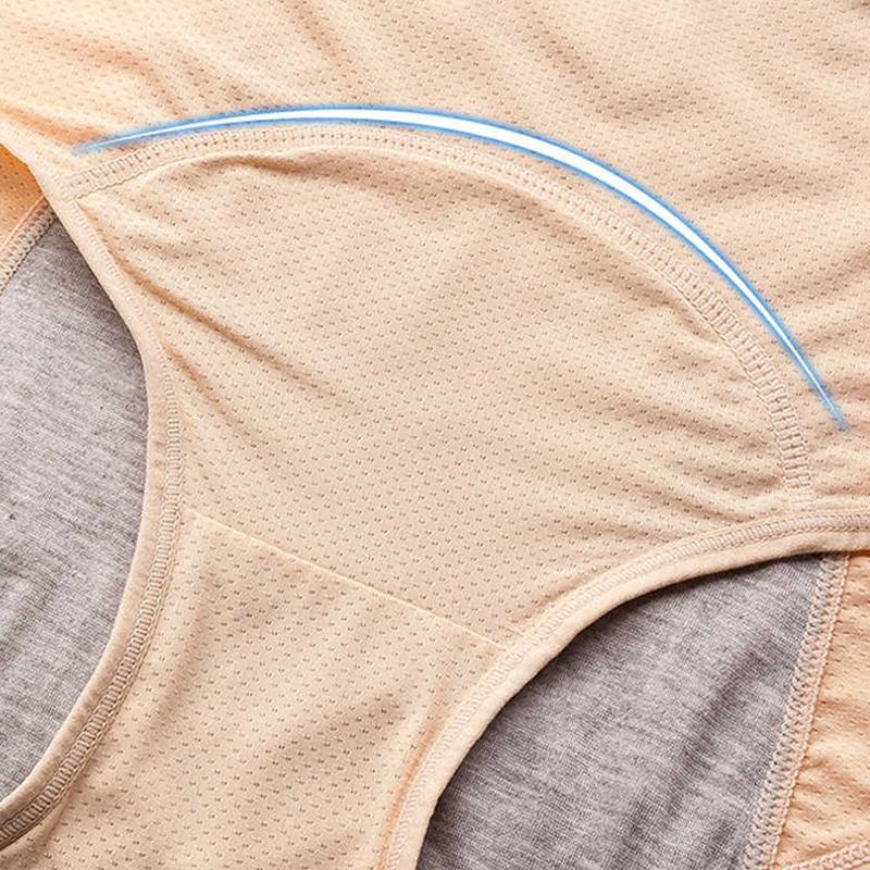 Detail des hautfarbenen Slips mit Netzstruktur, genähter Einlage und blau hervorgehobener Rundung des Saugeinsatzes. 11