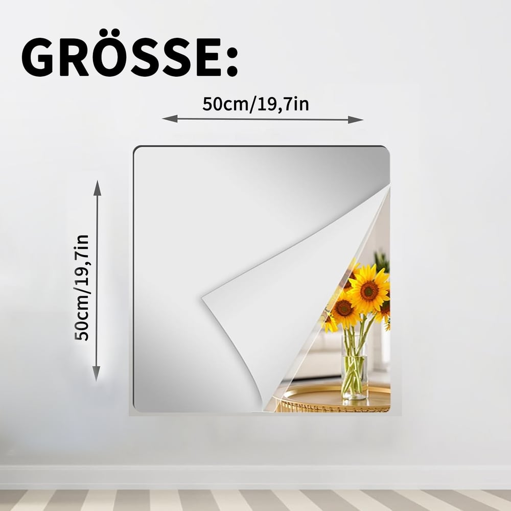Quadratische Spiegelfolie an einer weißen Wand mit abgelöster Ecke, die Maßangaben zeigen 50 mal 50 Zentimeter, im Spiegel eine Vase mit Sonnenblumen. 11